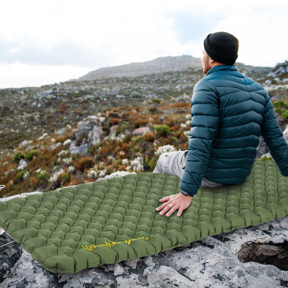 Naturehike insulated sleeping pad with 8-layer aluminum 3D insulation reduces heat loss.