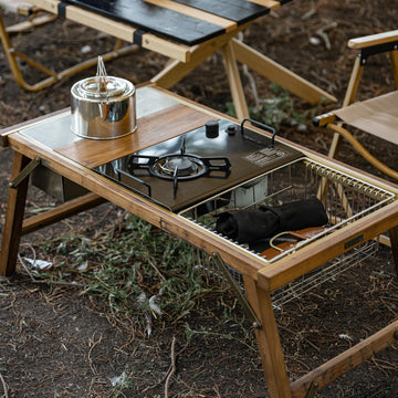 Naturehike portable stove folded for compact carry during trips.