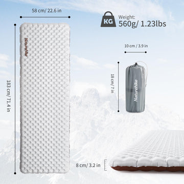 Naturehike sleeping pad inflated with ample room for two on campsite