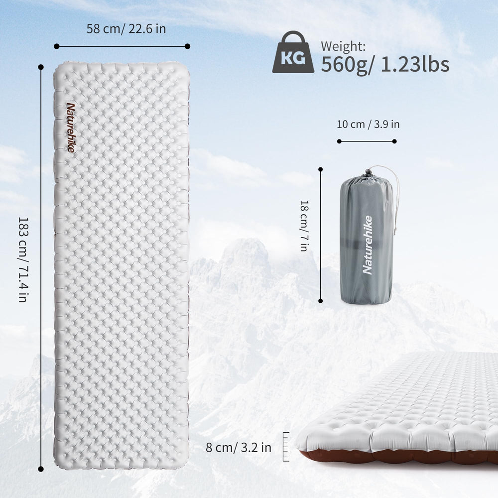 Naturehike sleeping pad inflated with ample room for two on campsite
