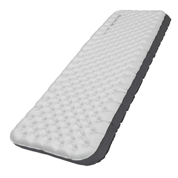 Naturehike ultralight sleeping pad inflated portrait demonstrates full support on uneven ground.
