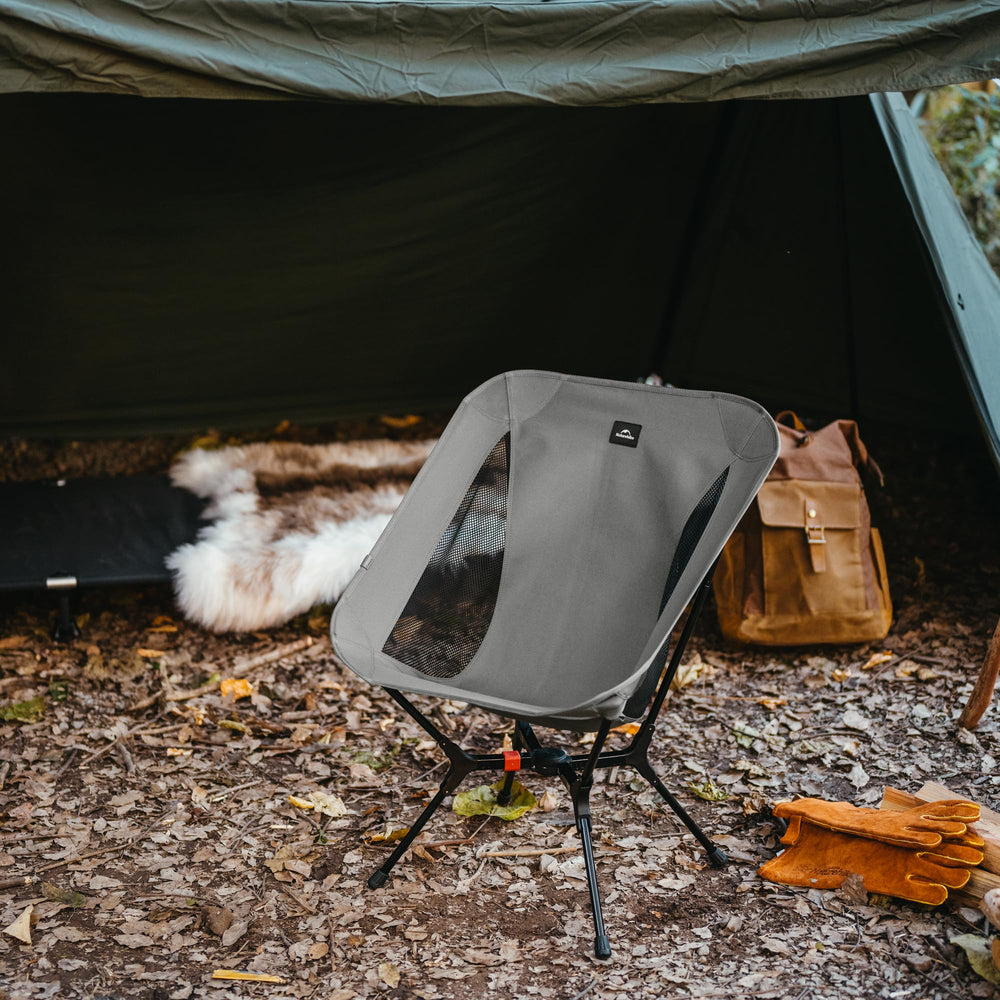 Naturehike YL01 frame close-up shows 7001 aluminum stability on uneven ground.