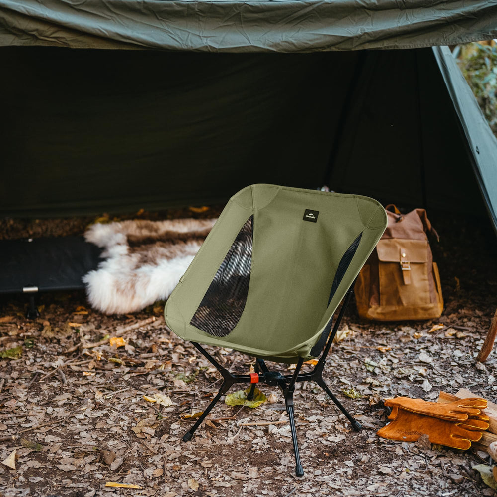 Naturehike YL01 X-frame stability offers secure seating on varied terrain.