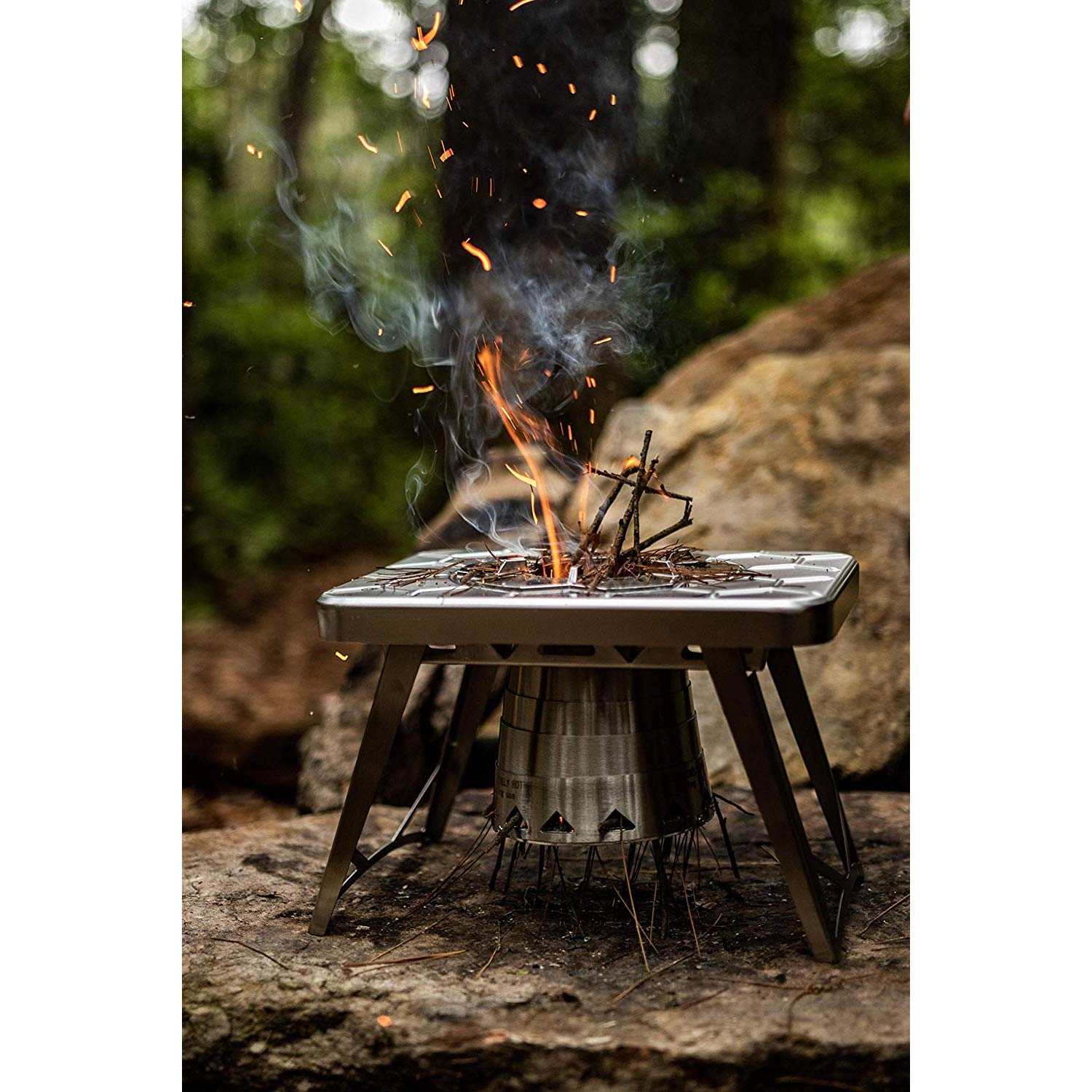 ncamp stove in use during camping with organized, efficient cooking setup