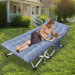 NESDCC cot with soft mattress pad provides comfortable sleep for guests.