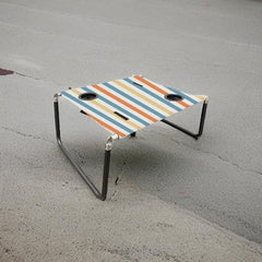 Neso Beach Table foldable-setup enables quick assembly for travels and picnics.
