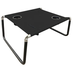 Neso Beach Table folded for compact portability and easy storage.