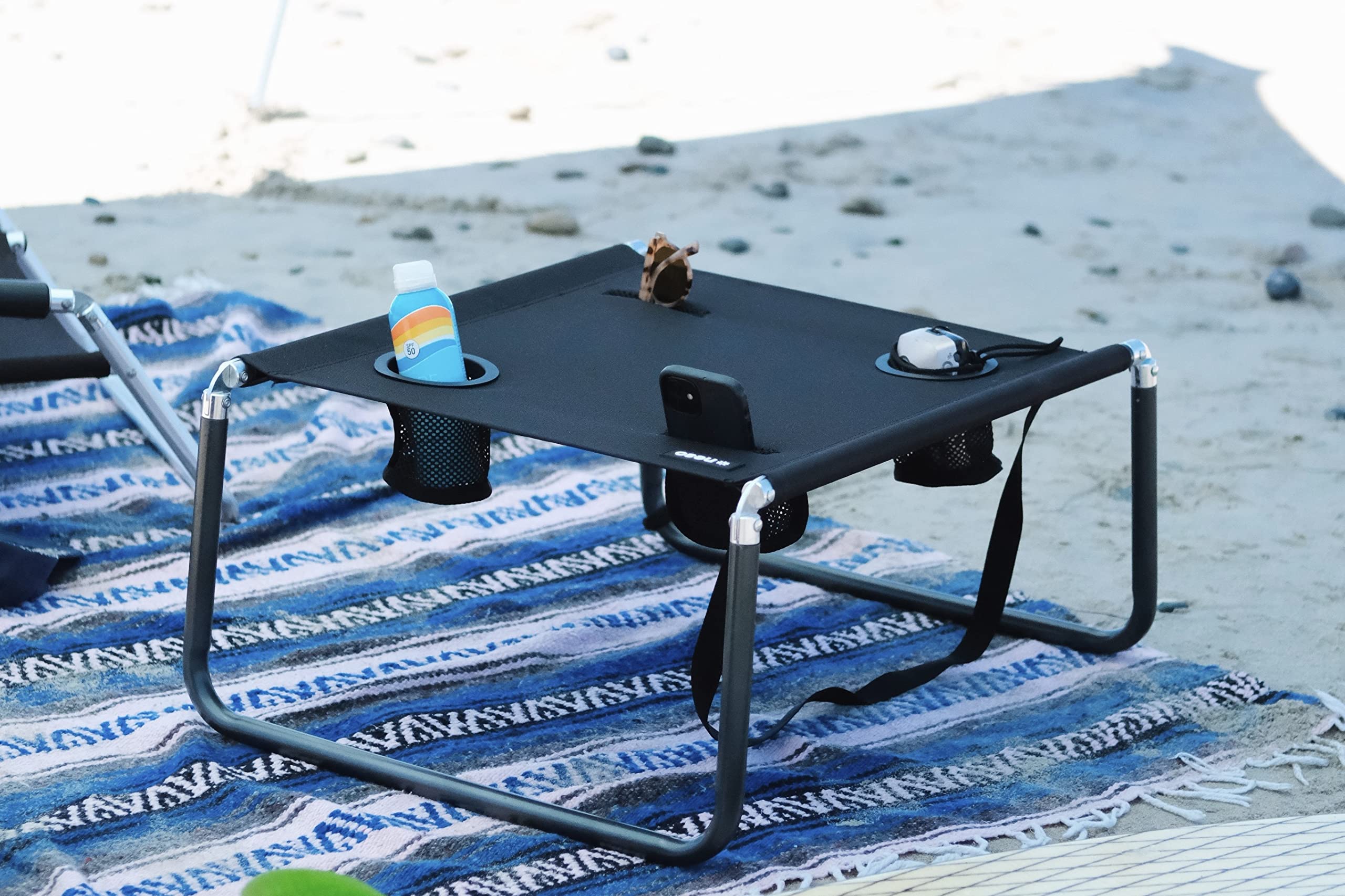 Neso Beach Table setup-ready demonstrates instant surface on sand.