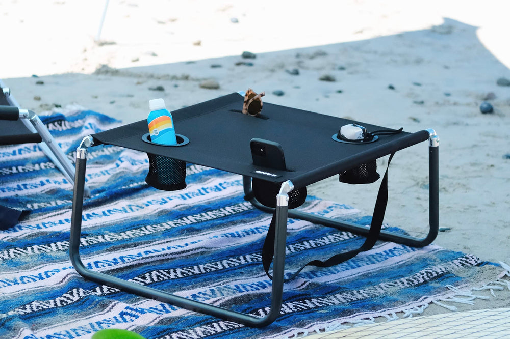 Neso Beach Table setup-ready demonstrates instant surface on sand.