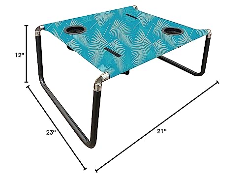 Neso Beach Table sits steady on sand, supporting drinks and devices.