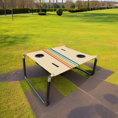 Neso Beach Table's stable legs perform well on sand, grass, or deck.