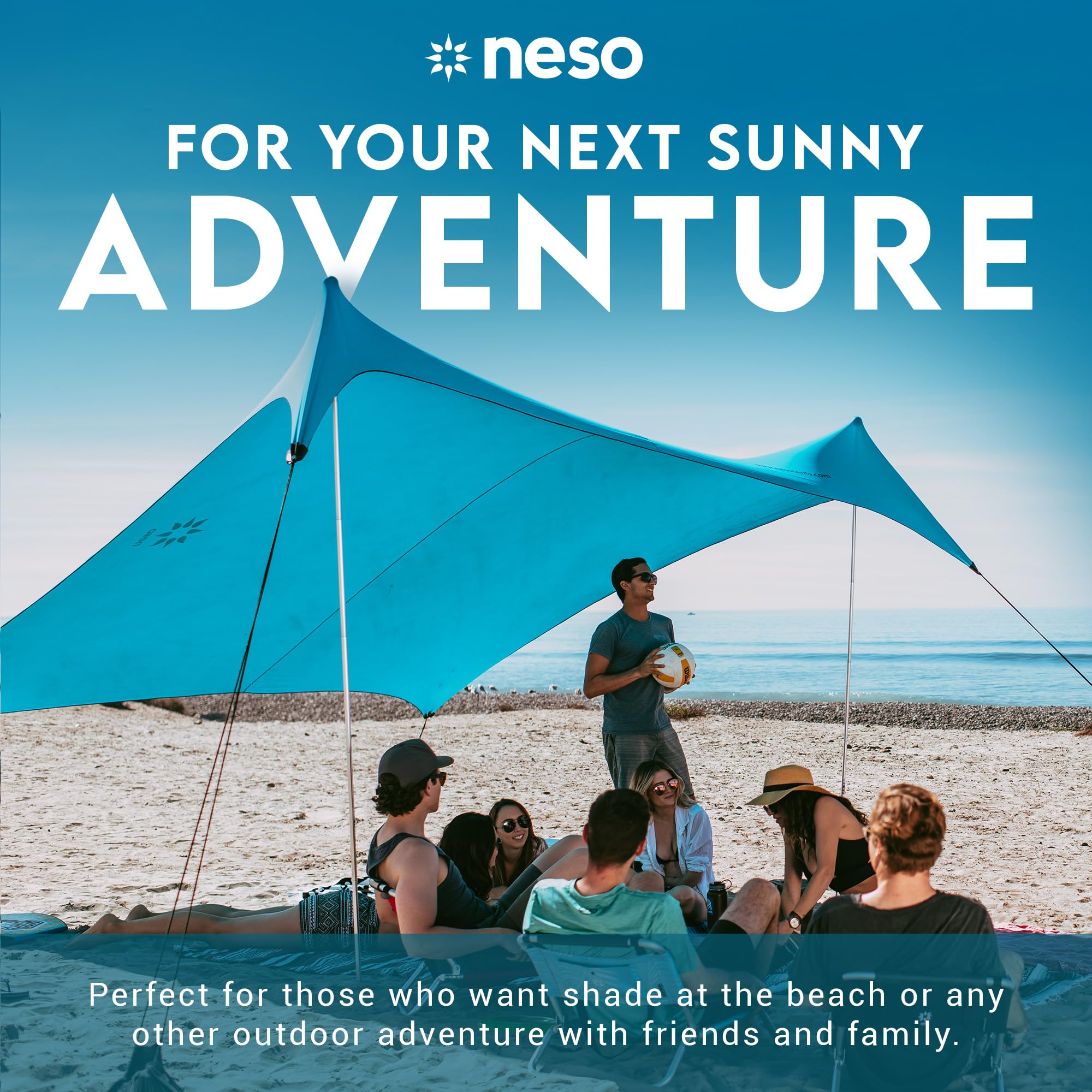 Neso Gigante 8ft-tall shade covers kids and chairs at the beach.