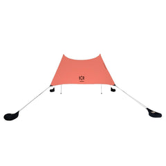Neso Grande beach tent folded for transport, lightweight shade on the go.