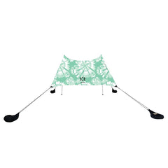 Neso Grande mint tie-dye beach tent open, offering wide shade and UPF 50+ sun protection.