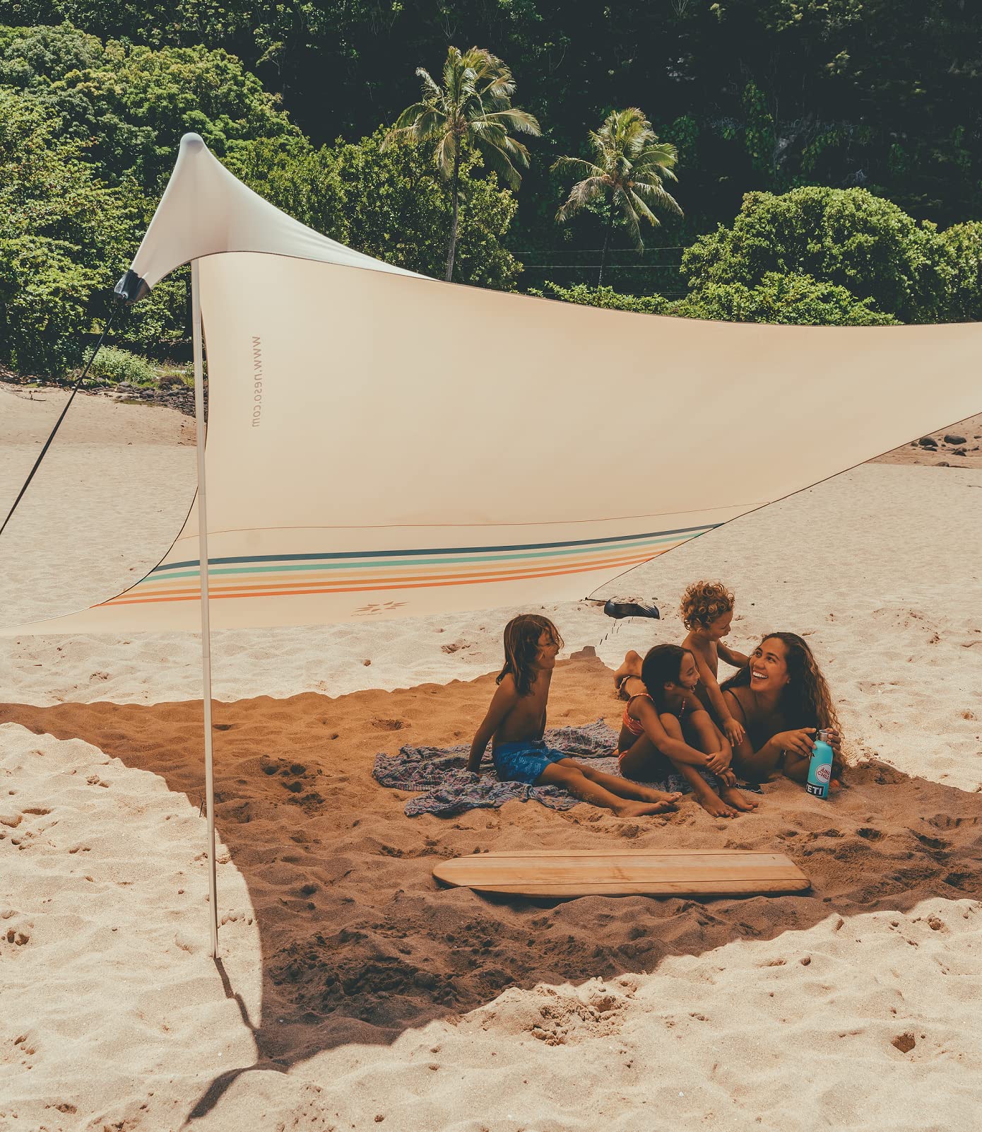 Neso Grande rainbow shade closeup highlights colorful fabric and UPF 50+ protection.