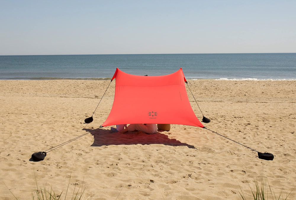 Neso Lehua Red sand anchor usage shows stable shade near the surf.