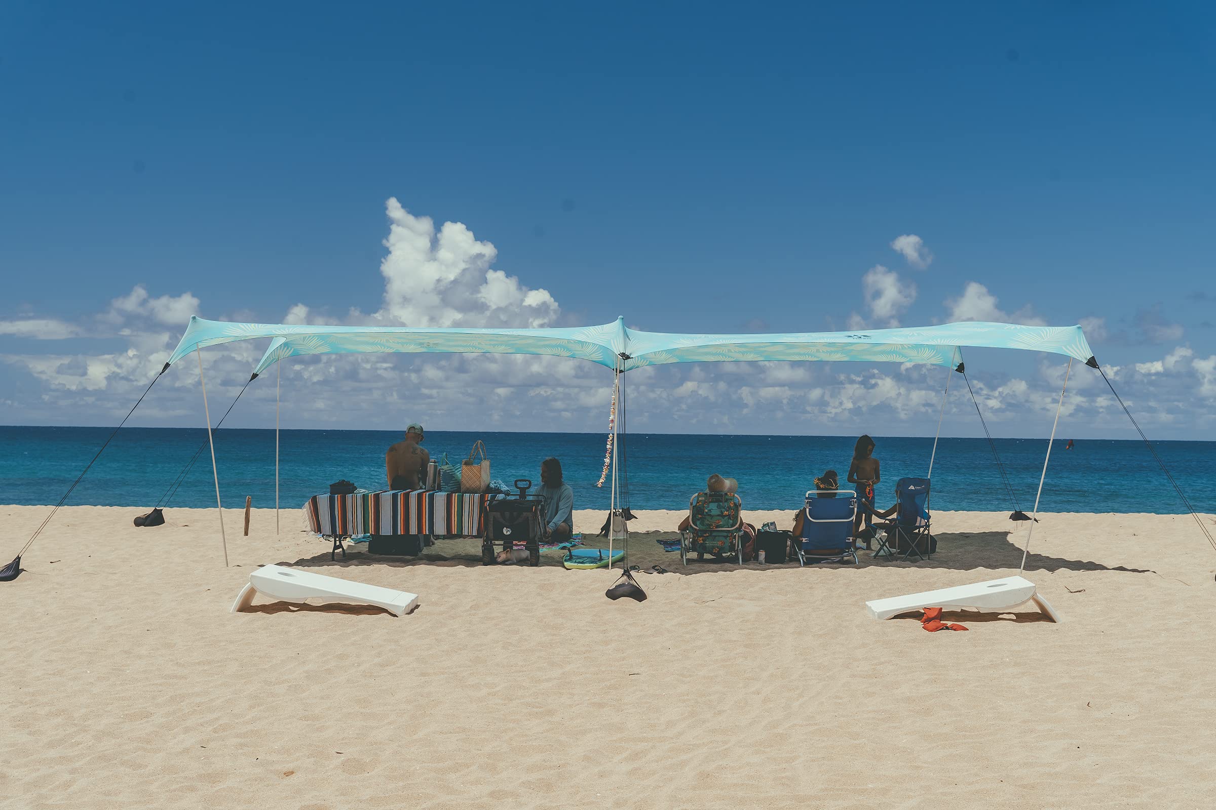 Neso Aqua Fronds side view shows sturdy aluminum poles for reliability.