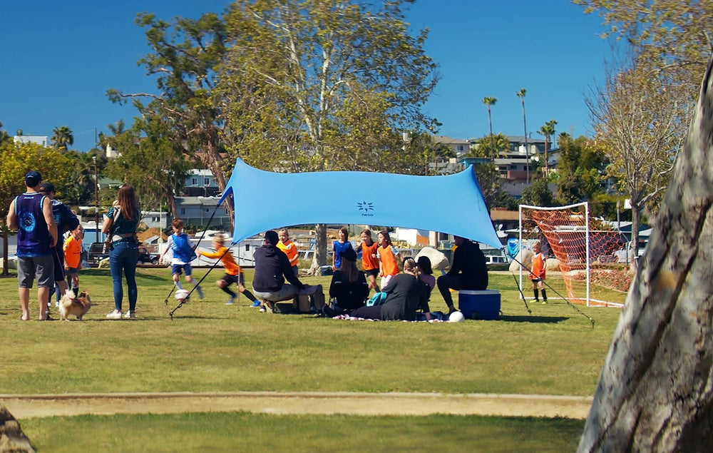 Neso Sidelines Grande front view offers breathable shade for sideline comfort during games.