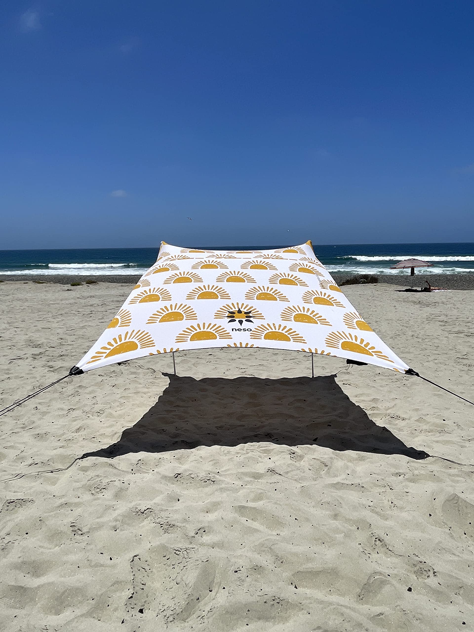 Neso sun shelter 7x7ft setup for easy beach shade on the go.