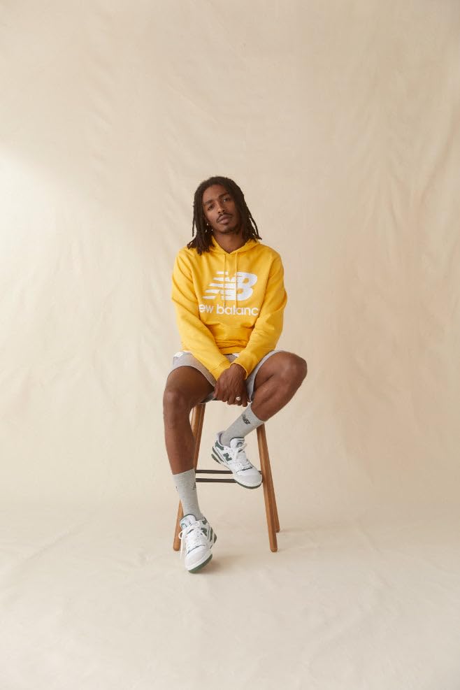 New Balance Raspberry hat back closure demonstrates adjustable hook-and-loop fit