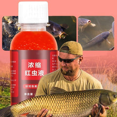 Close-up of red liquid attractant in bottle