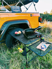 Nice C Tailgate Table folded flat for compact storage and transport
