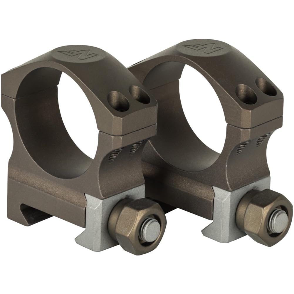 Nightforce X-Treme Duty Ultralite 34mm rings with titanium crossbolts for durable performance.
