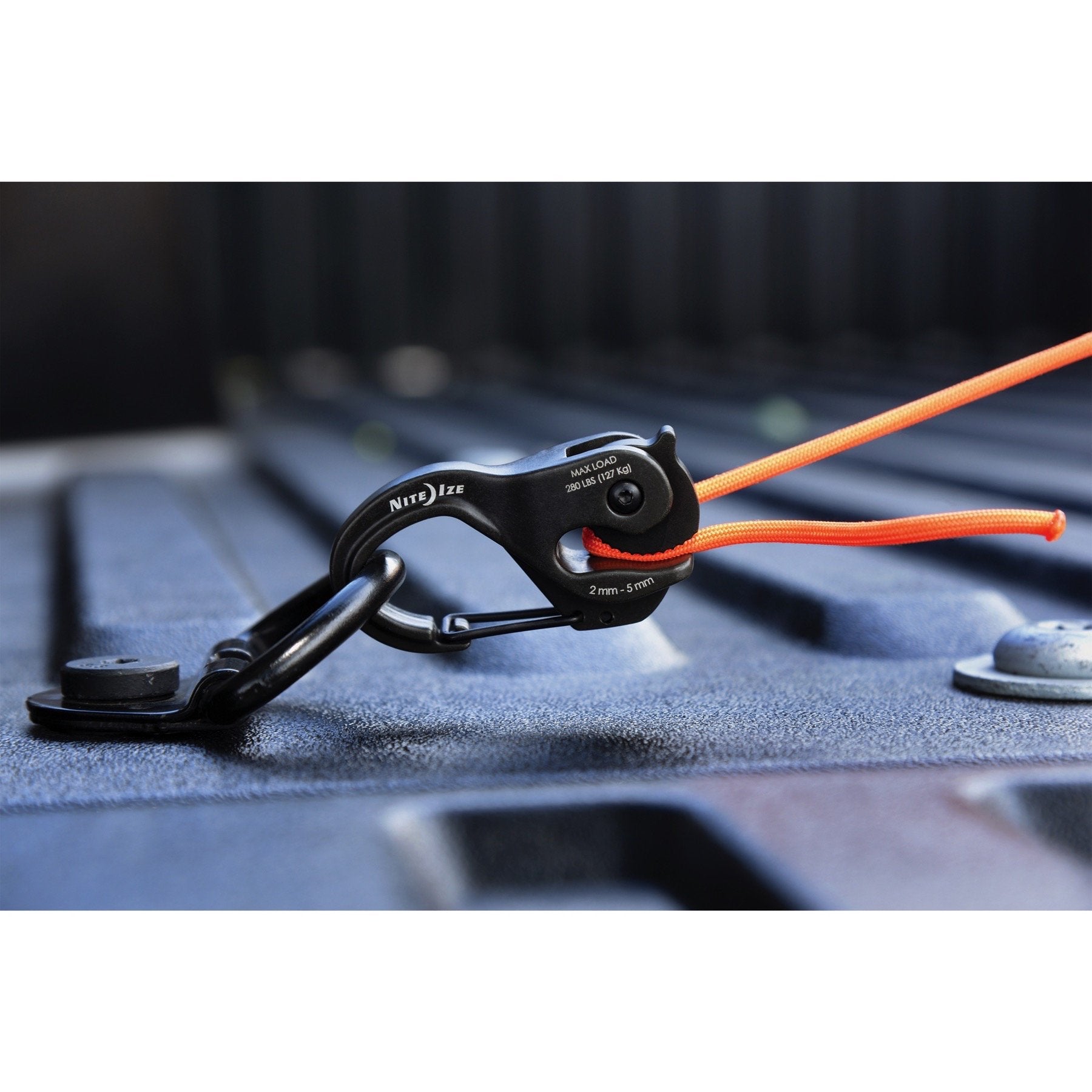 Nite Ize CamJam XT black in use setup on an outdoor rig.