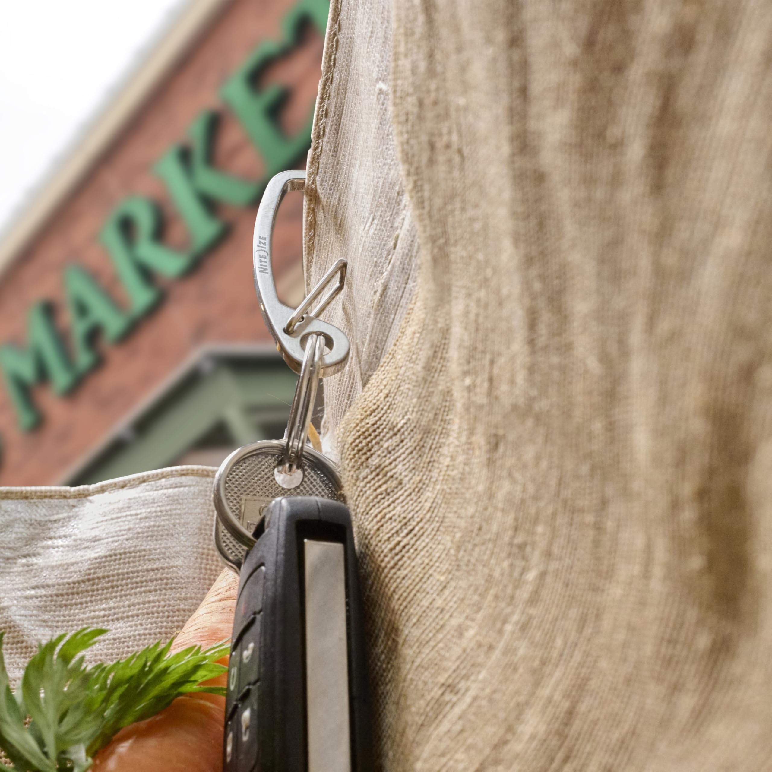 Nite Ize Deep Pocket enables quick key release with a spring gate.