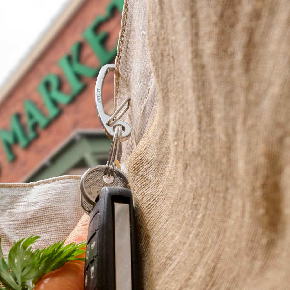 Nite Ize Deep Pocket enables quick key release with a spring gate.