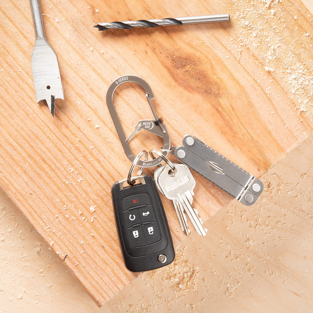 Stainless steel G-Series SlideLock #3 carabiner clips securely to belts and bags.