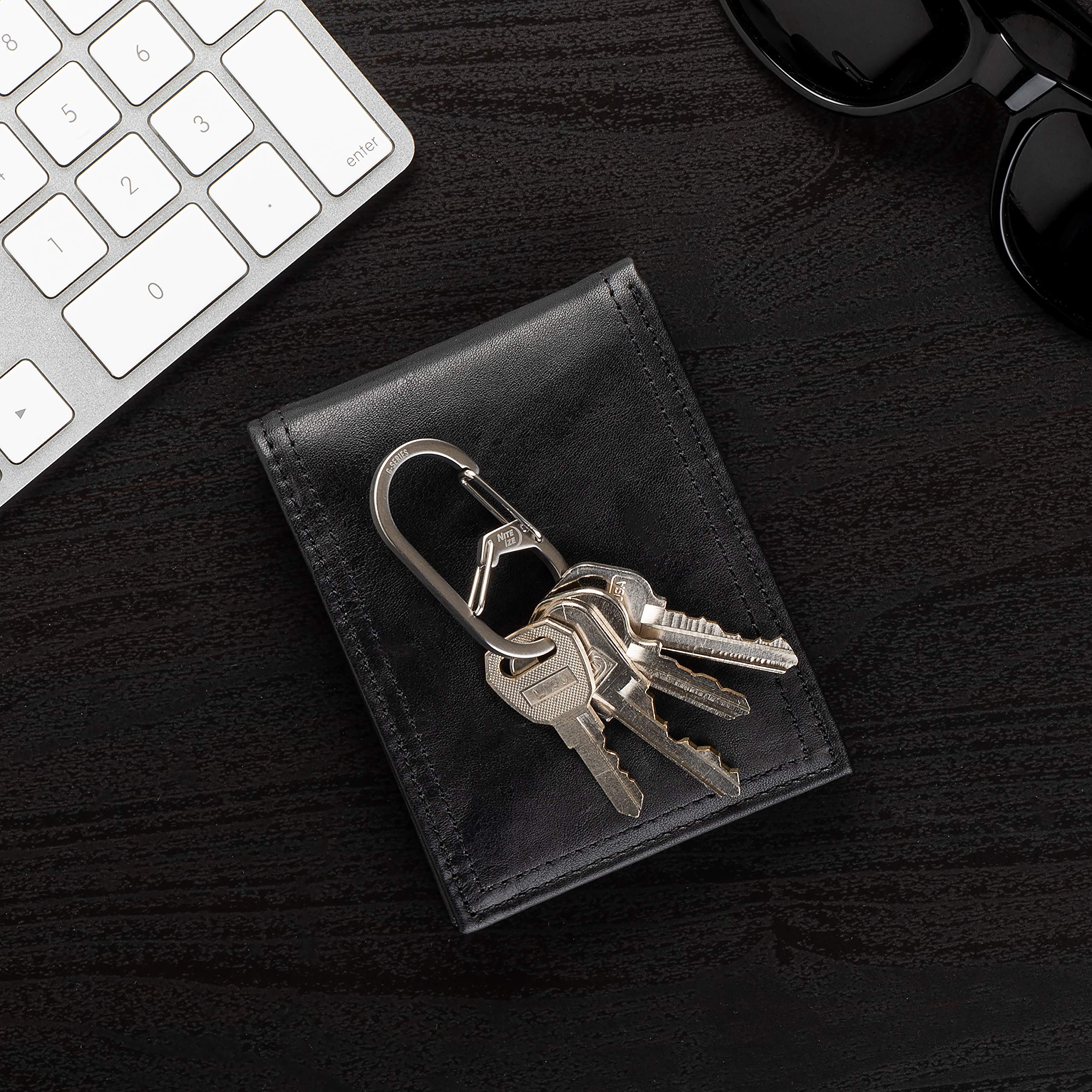 Bottom chamber keeps keys securely attached during daily activities