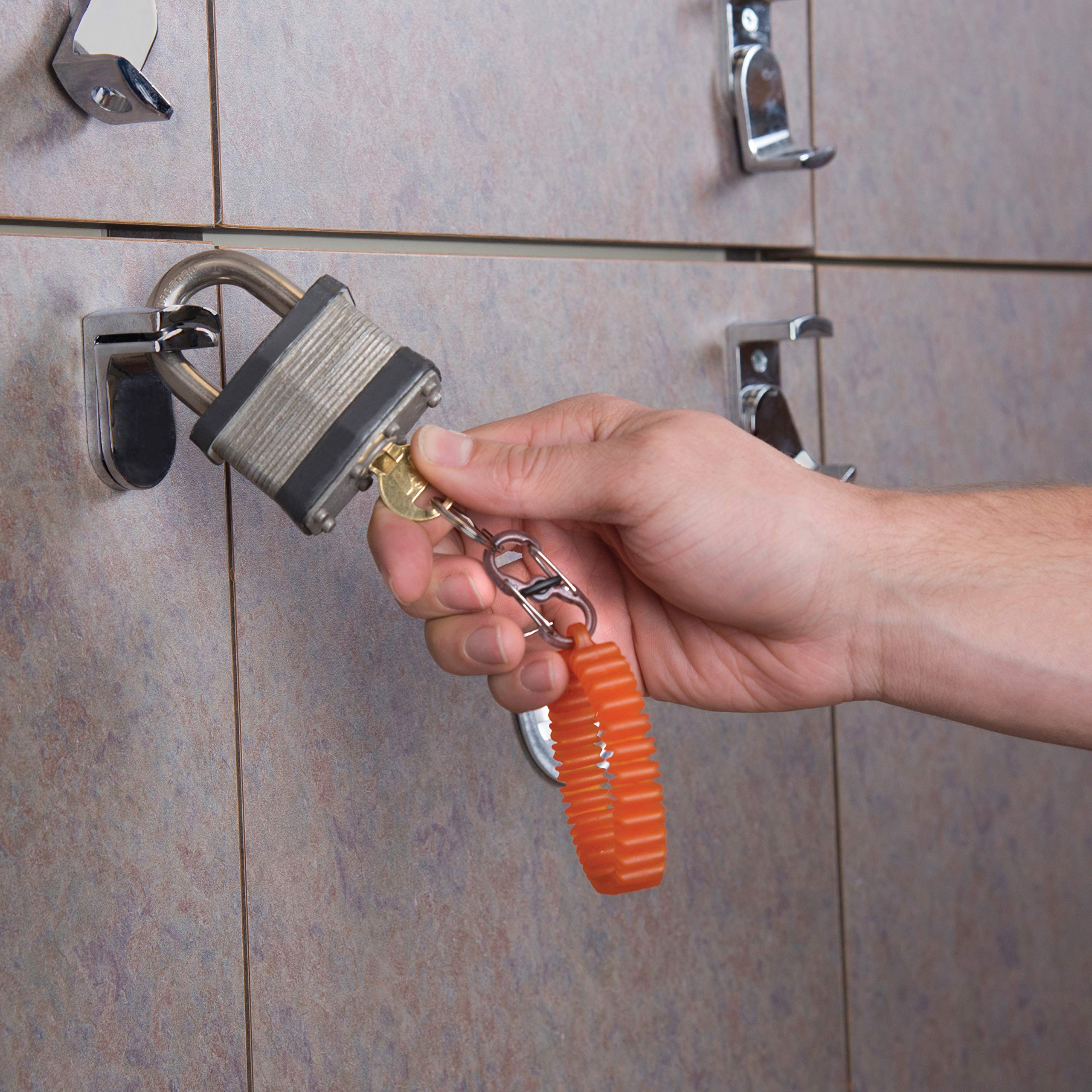 Nite Ize Integrated key slot carries a key flush against skin.