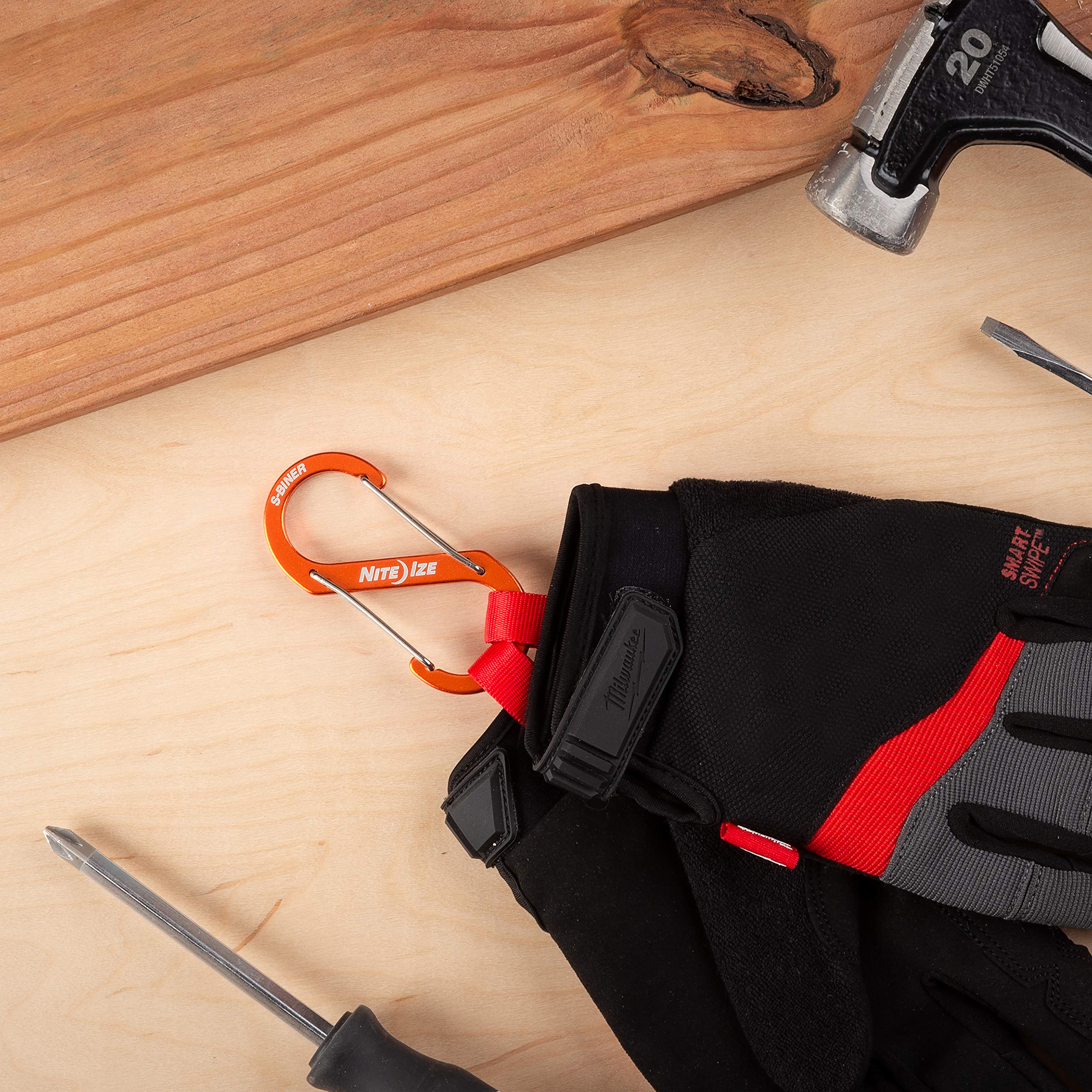 Nite Ize S-Biner attached to a backpack strap for quick access.