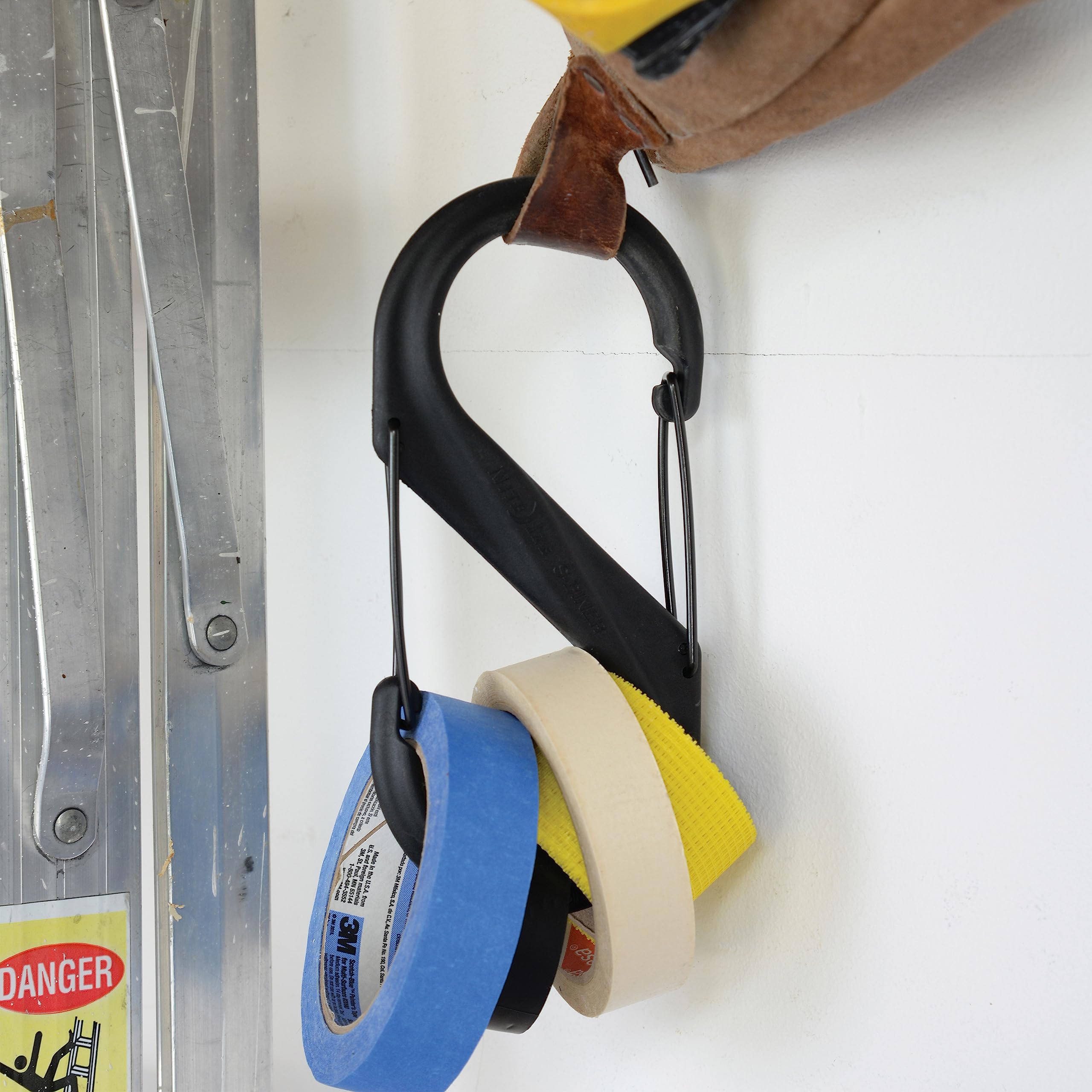 Nite Ize S-Biner supports hanging bicycle wheels and heavy items with two gates.