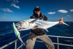 Nomad Design DTX Minnow 165 PFUS diving depth 34ft visual emphasizes deep-water trolling potential.