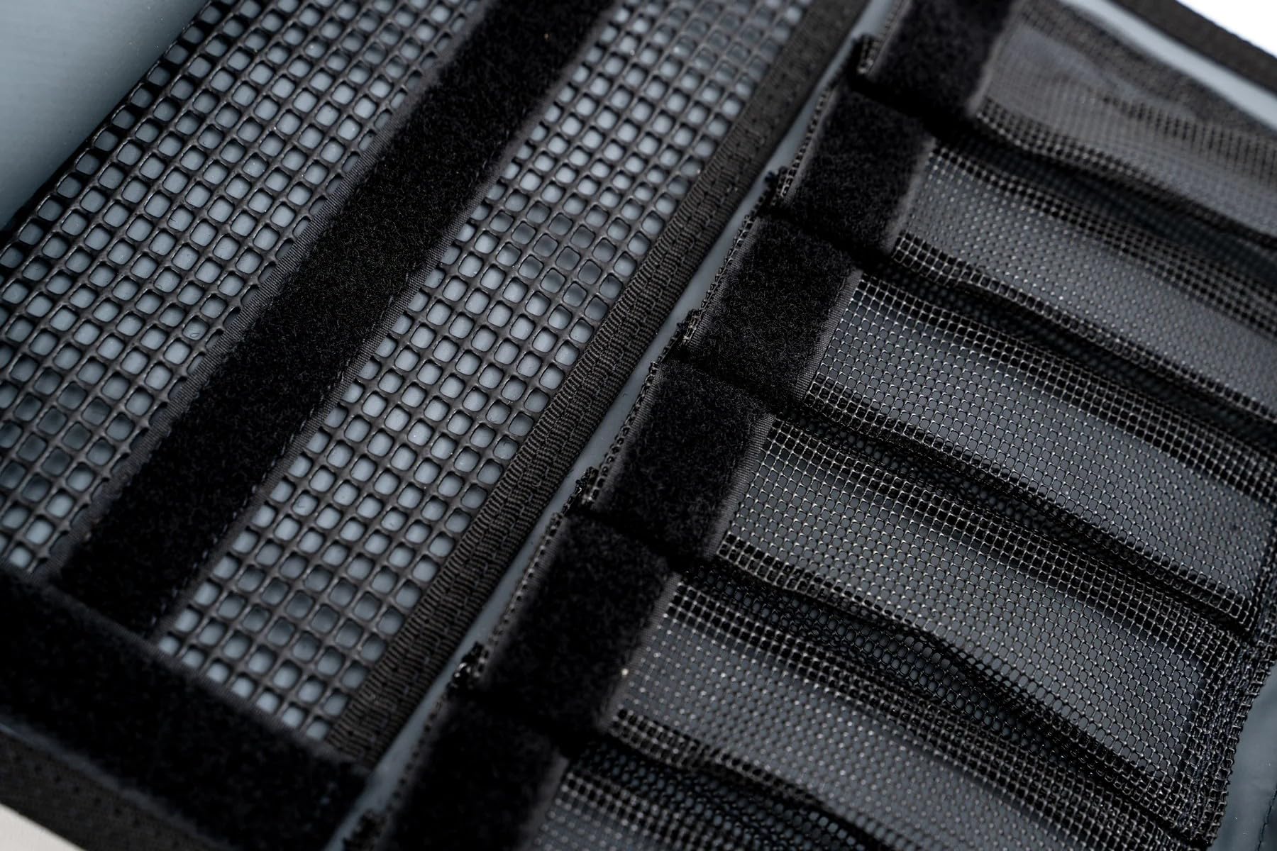 Nomad Design Jig Wallet Insert Sleeve emphasizing durable, water-resistant protection against saltwater.