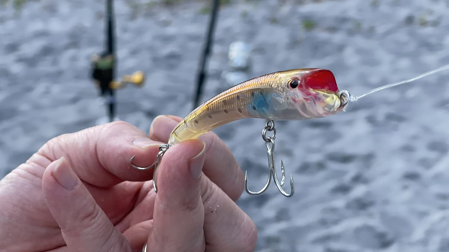 Nomad Design Maverick 90 Aqua Ghost surface-walk capture demonstrates surface presentation for wary fish.