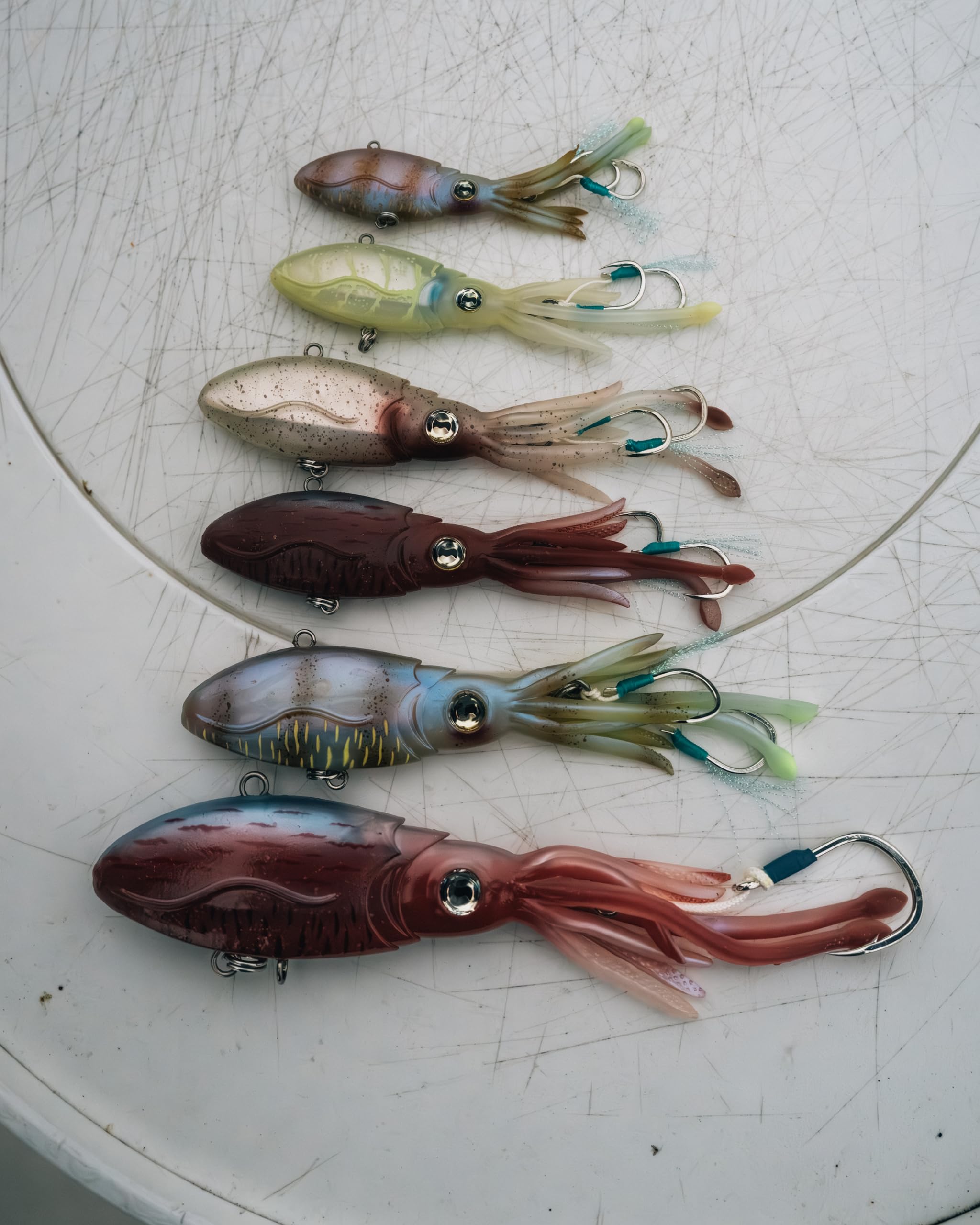 Nomad Design Squidtrex lure being trolled showing pulsating action.