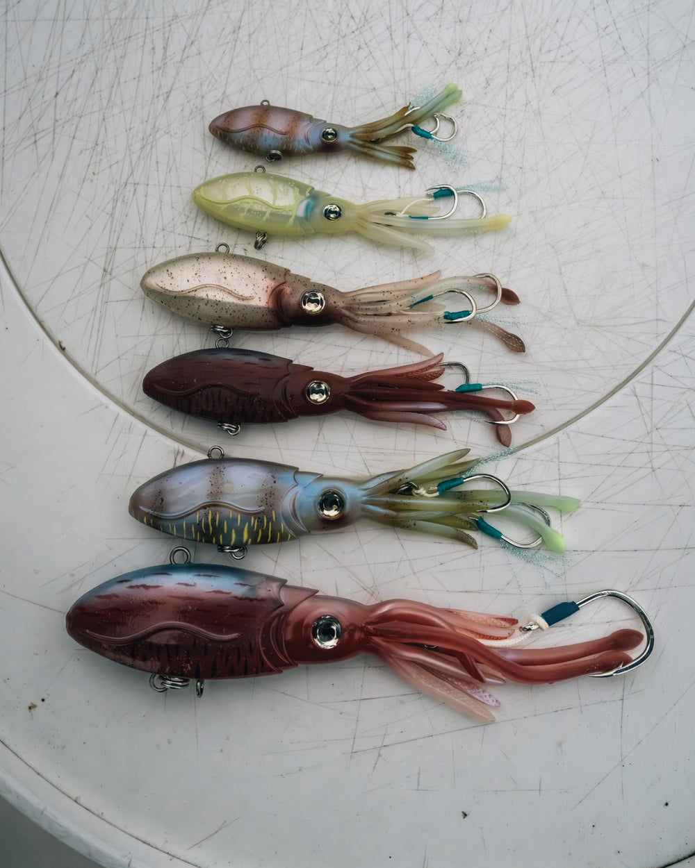 Nomad Design Squidtrex lure being trolled showing pulsating action.