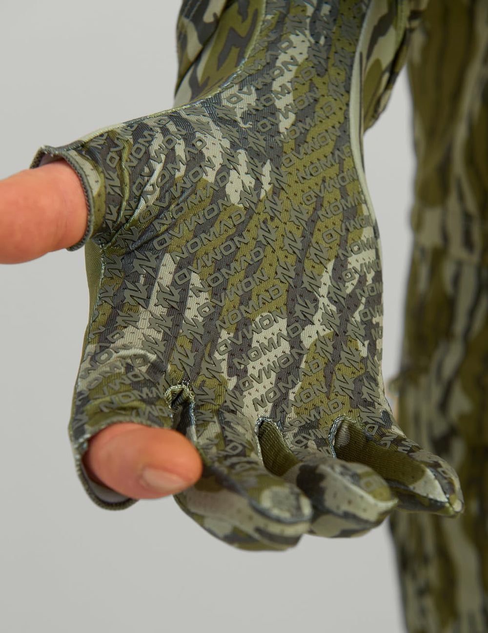 NOMAD glove palm grip with gusseted design enhances grip on gear