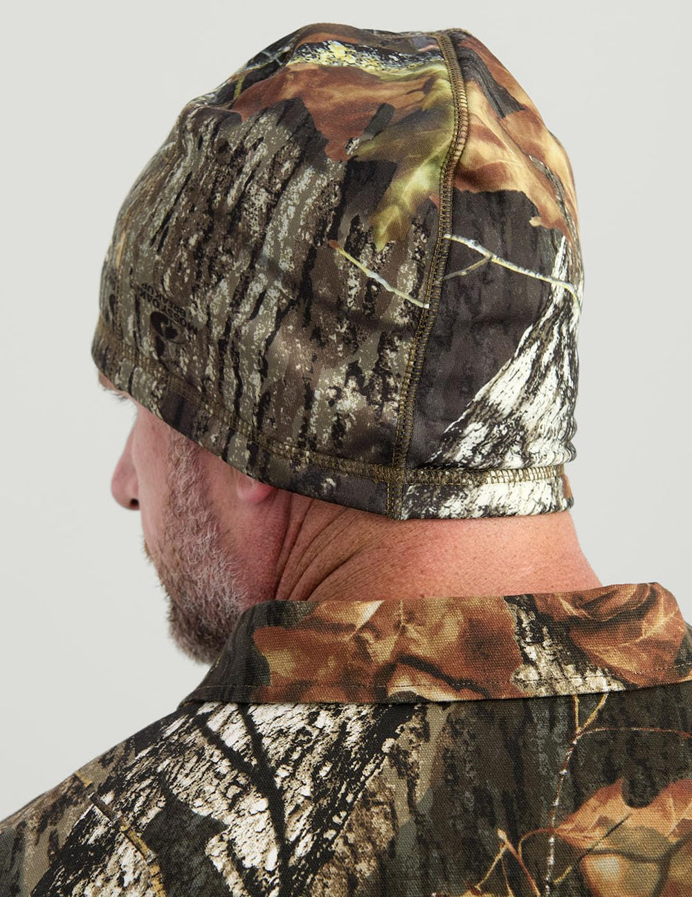 Nomad Axe Beanie folded brim demonstrating packable design for easy carry.