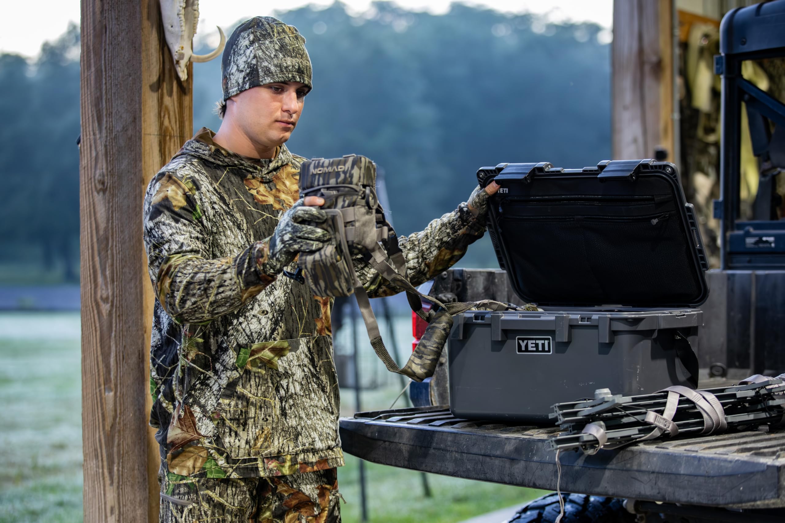 Nomad Axe Beanie in rugged outdoor setting shows versatility for hunting and fishing.