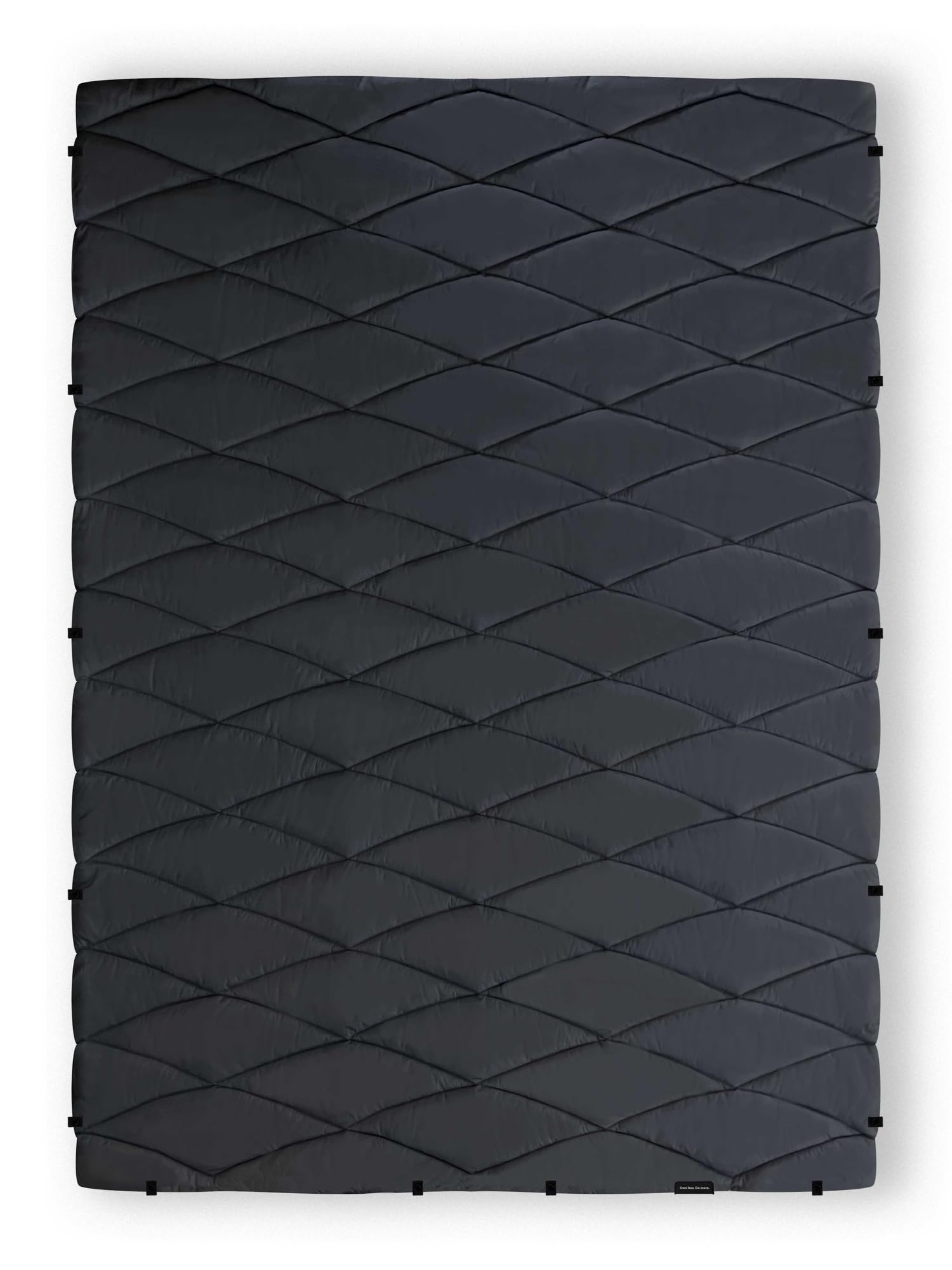 Nomadix Puffer Blanket compact for travel and everyday car trips.
