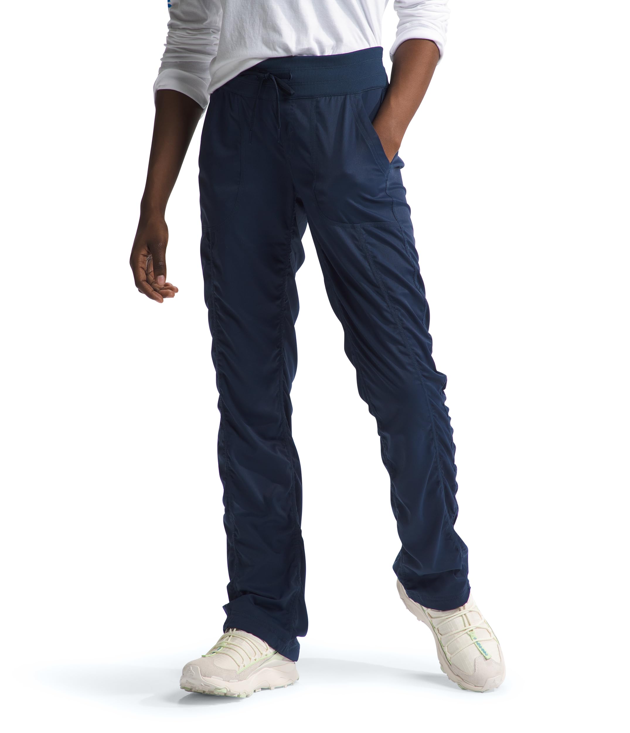 The North Face Aphrodite 2.0 Pant on trail shows moisture-wicking comfort for hiking.