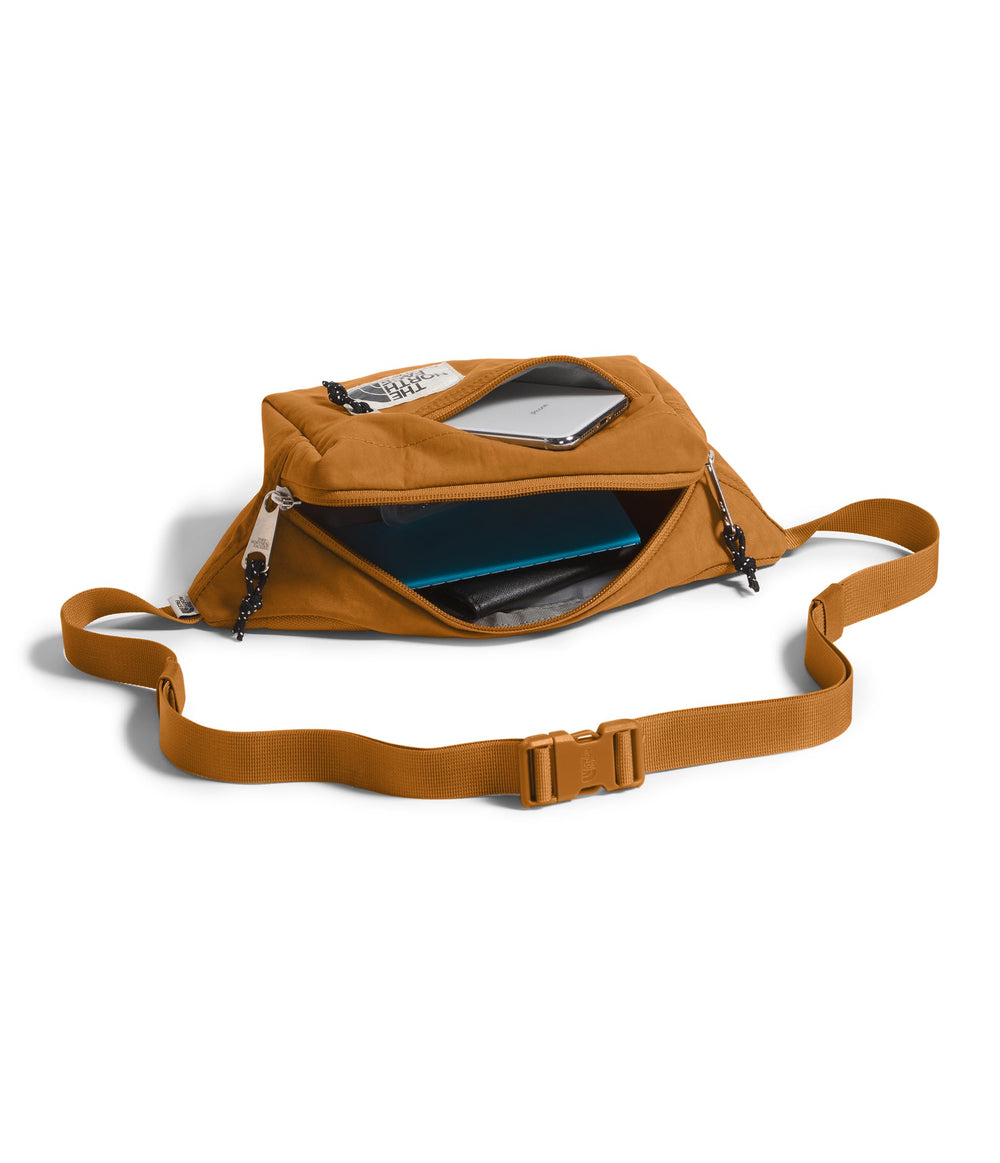 The North Face Berkeley Lumbar Bag water-repellent finish protects valuables in light rain.