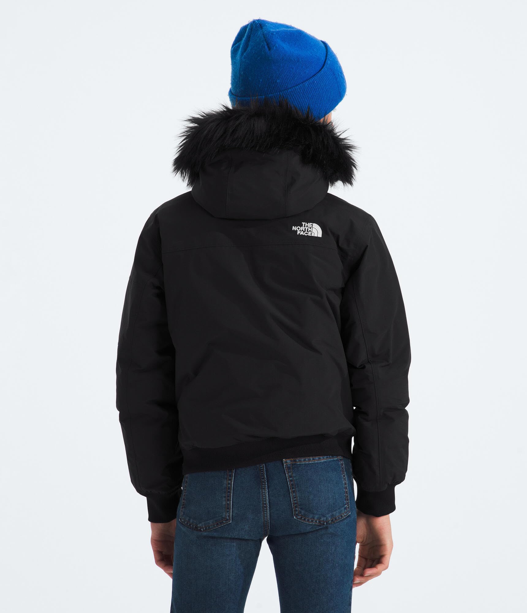 The North Face Teen McMurdo Hooded Jacket DWR finish sheds rain and slush.