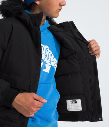 The North Face Teen McMurdo Hooded Jacket hood detail emphasizes warm insulation in cold winds.