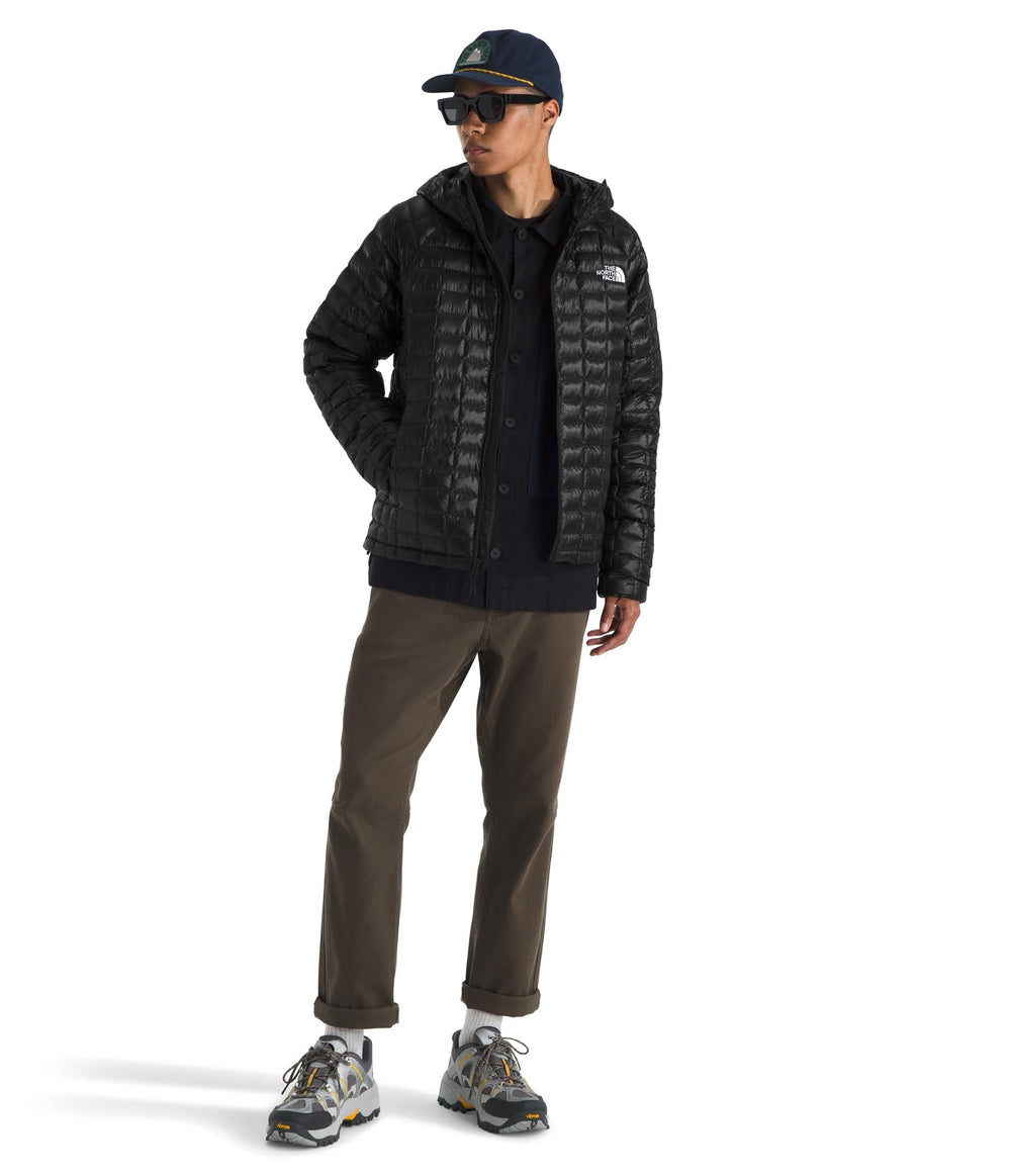 The North Face Thermoball Hooded Jacket features adjustable hood for tailored warmth.