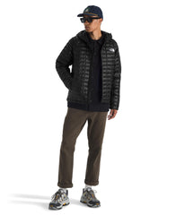 The North Face Thermoball Hooded Jacket features adjustable hood for tailored warmth.